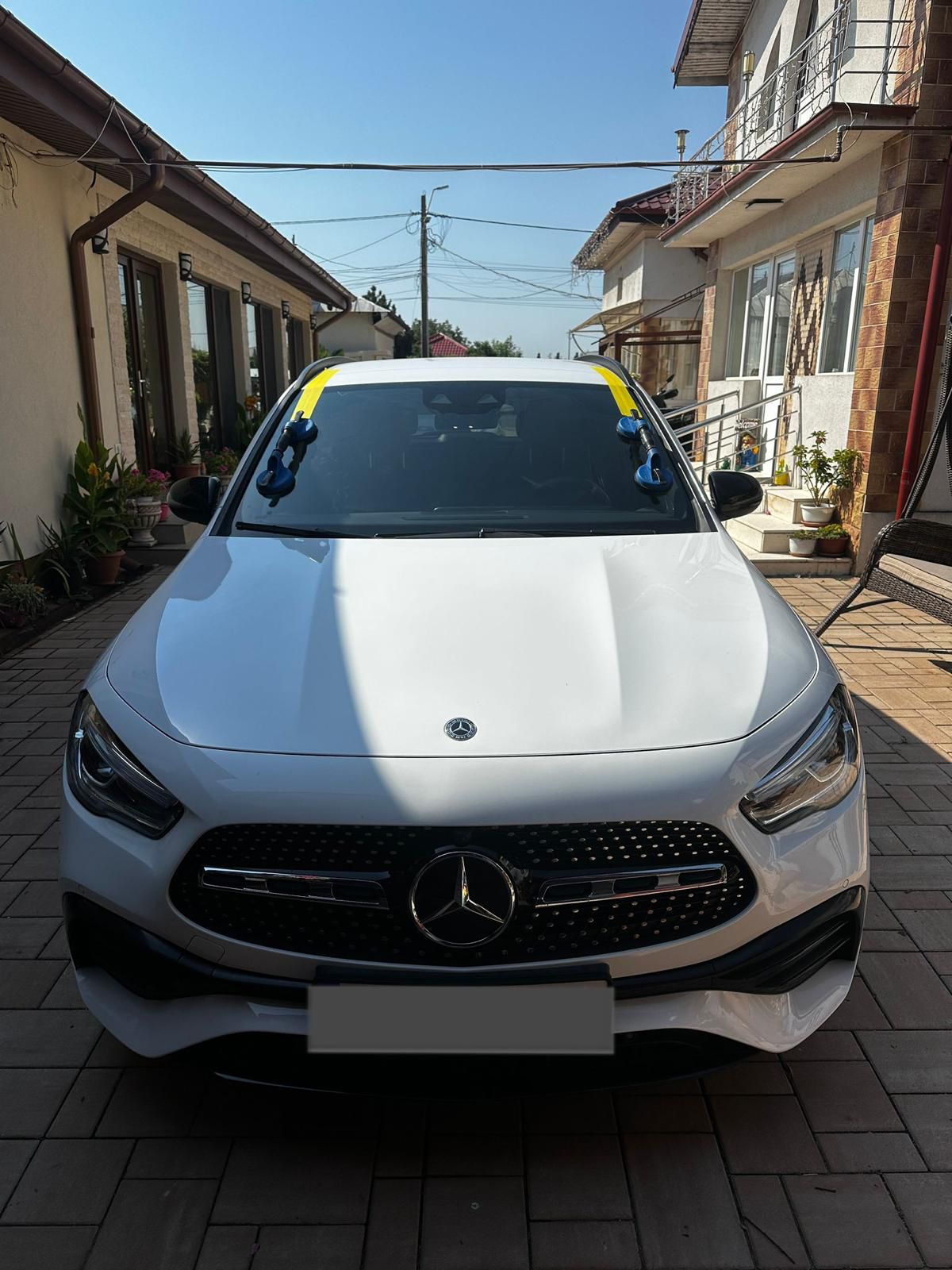 Mercedes GLA — windshield, driveway